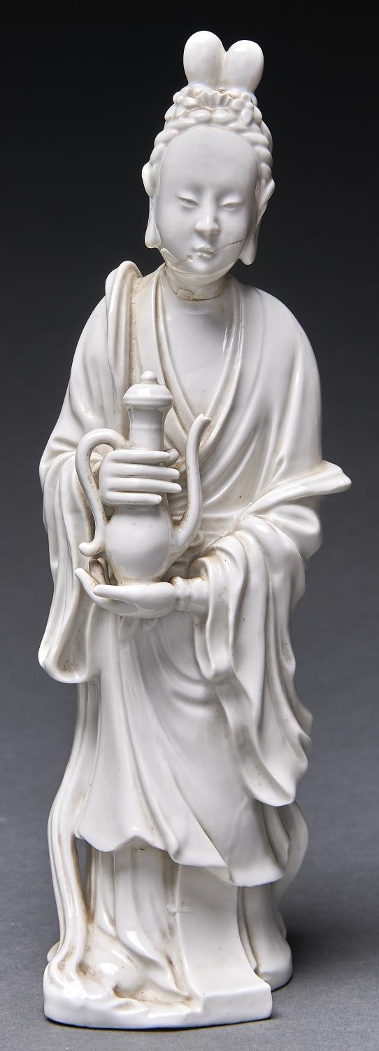 A Chinese blanc de chine figure of Guanyin,  22.5cm h Head restuck