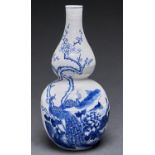 A Chinese blue and white double gourd vase,  painted with peafowl, 33cm h Good condition