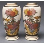 A pair of Japanese Satsuma vases, Taisho period, shouldered oviform, decorated with chrysanthemums