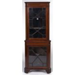 An Edwardian mahogany standing corner display cabinet, c1910, astragal glazed upper and lower