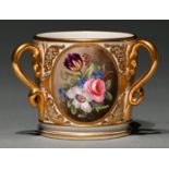 A Sampson Hancock  three handled  cup, c1900, painted with three floral medallions between raised
