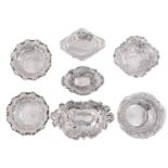Four and a pair of Victorian die stamped silver bonbon dishes and one other, later, 16.5cm and