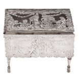 Dutch Toy.  A miniature silver drop leaf table, the leaves and openwork hinged top cast with