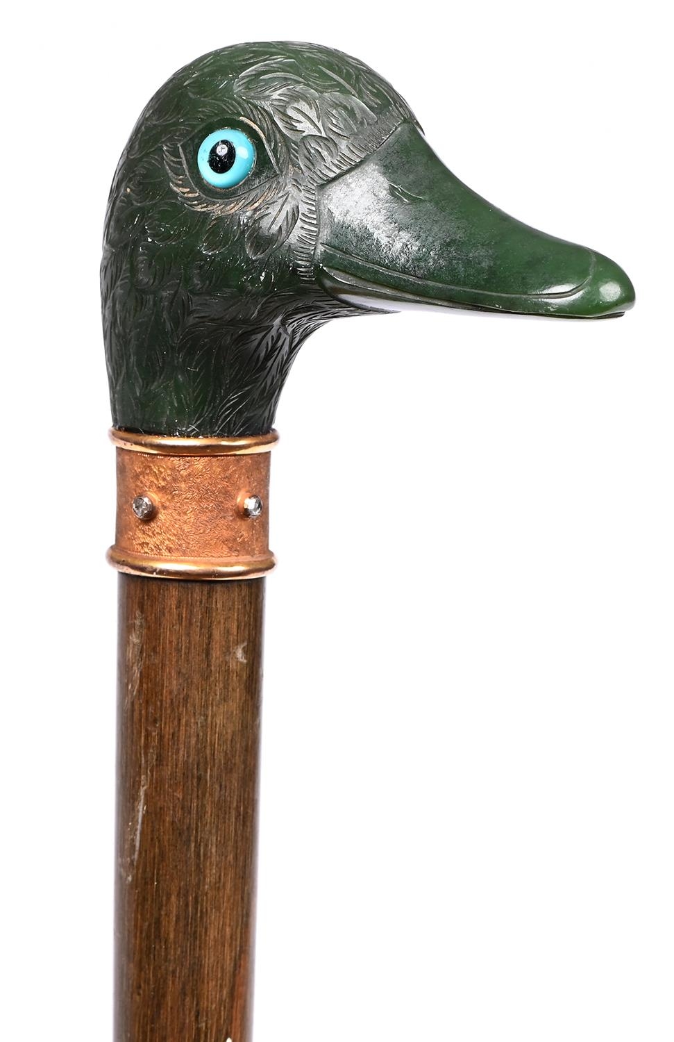 A hardstone handled parasol, Brigg & Sons London & Paris, early 20th c, the finely carved nephrite