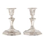 A pair of Victorian silver dwarf octagonal candlesticks, nozzles, 14cm h, by John Round & Son Ltd,