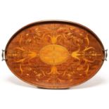 An Edwardian oval mahogany and inlaid gallery tray, with brass handles, 69.5cm over handles Good