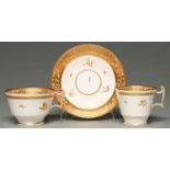 A Spode bone china trio, c1815, of London shape in an apricot and gilt set pattern, saucer 14cm
