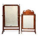 A George I style mahogany toilet mirror,  46cm h and another dressing table mirror with arched plate
