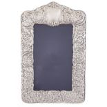 A pair of Elizabeth II  silver photograph  frames,  backed on navy velvet, 42cm h, by Carrs of