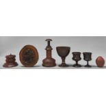 A group of treen objects, comprising an ornamental turned boxwood wide based jar and cover, early