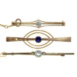 Three diamond, sapphire and aquamarine bar brooches, early 20th c, in gold, 39-51mm, one marked 9ct,