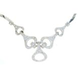 A diamond necklet in white gold, 40cm l, marked 750, 12.2g Good condition