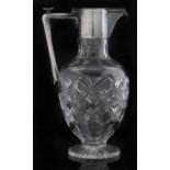 An EPNS mounted cut glass claret jug, second quarter 20th c, 24.5cm h Pushpiece working, causing the