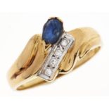 A sapphire and diamond ring, in gold marked 18ct, 2.9g, size N Good condition