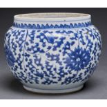 A Chinese blue and white jar, Qing dynasty, 18th c, globular and painted with lotus meander, 15cm h,