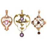 Three art nouveau amethyst and other gem set openwork gold pendants, early 20th c, largest 47mm,