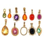 Eleven 9ct gold pendants, variously gem set, 17mm excluding loop and smaller, various makers and