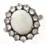 An opal and white sapphire cluster ring, gold hoop, 3g Opal slightly scratched evident when viewed