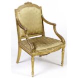 A French giltwood bergere, c1900, in Louis XV style, the leaf carved and curved frame with padded