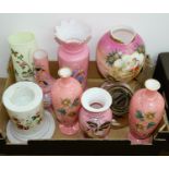 A quantity of Victorian enamelled glass vases, mainly pink, all decorated with flowers, grasses