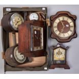 A late 19th c American stained pine mantel clock, an art deco style oak cased mantel clock,