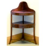 A George III mahogany corner washstand, 106cm h; 40 x 60cm Minor shrinkage crack on top of centre