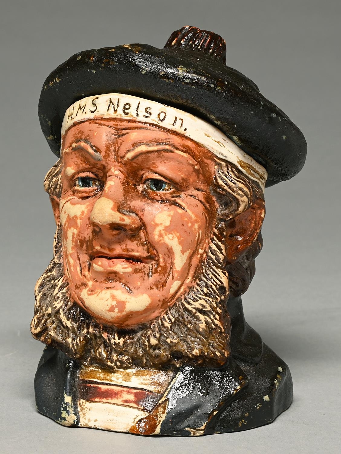 A Bernard Bloch cold painted white terracotta sailor's head novelty tobacco jar and cover, late 19th