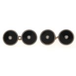 A pair of gold, platinum, black onyx and split pearl cufflinks, c1930, marked 18ct & PT, 8.9g Good