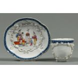 A Chinese export blue and white coffee cup with applied decoration and a similar saucer, c1770,