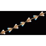 A gold bracelet, the bow shaped links set with cultured pearls and turquoise, marked 18k, 9.7g