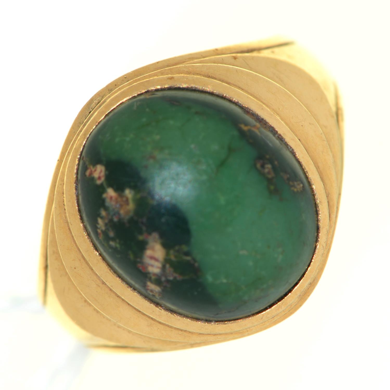 A turquoise ring, in gold marked 14k, 6.7g, size O Stone chipped and lacks polish; light wear