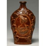 A saltglazed brown stoneware flask,  probably Derbyshire or Yorkshire, c1837,  moulded to either