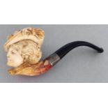 A meerschaum tobacco pipe, early 20th c, the bowl carved with the head of a lady of fashion in a
