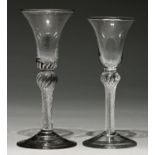 Two English wine glasses, c1750, the bell bowl on multi series air twist stem and conical foot, 15.5