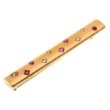 An art deco ruby and diamond bar brooch in the form of a gold baton, c1930, 60mm l, unmarked, 7g