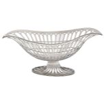 An Edwardian pierced silver bonbon dish,  with reeded rim, on pierced foot, 20.5cm l, by Martin,