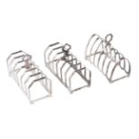 A pair of Edward VIII silver toast racks, 11cm l, by Viners Ltd, Sheffield 1936 and one other by H C