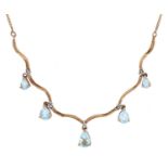 A topaz and diamond fringe necklet, in 9ct gold, 3.9g Good condition