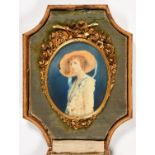 British School, early 20th c - Portrait Miniature of a Young Woman, half length, in a bonnet with