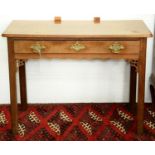 A George III mahogany side table, late 18th c, the rectangular top with re-entrant moulded corners