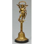 A Victorian brass Putto figural doorstop, mid 19th c, on cast iron base, 44cm h Handle bent but