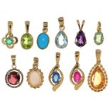 Eleven 9ct gold pendants, variously gem set, 18mm excluding loop and smaller, various makers and