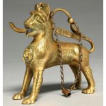 An Indian brass lion oil lamp, late 19th c, with chained stopper, 13cm h Good condition with old