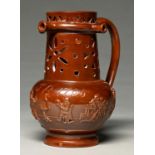 An English saltglazed brown stoneware puzzle jug, Derbyshire or Nottinghamshire, second quarter 19th