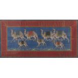 Indian School, 19th/20th c - Seven caparisoned Camels, gouache on blue silk in red and gold frame,
