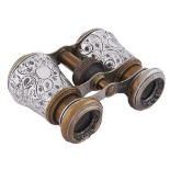 A pair of French nickel plated brass opera glasses with contemporary English silver barrels,