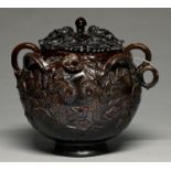 An unusual lead glazed earthenware wassail pot and cover, late 19th c, globular with loop and