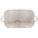 A George VI silver tea tray, the moulded border with re-entrant angles, 60cm over handles, by