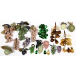 A collection of Chinese rose quartz, green stone and other models of fruit, 20th c