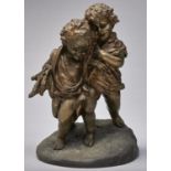 After Giuseppe D'Aste - A patinated bronze figure group of two lightly clad infants, one holding a